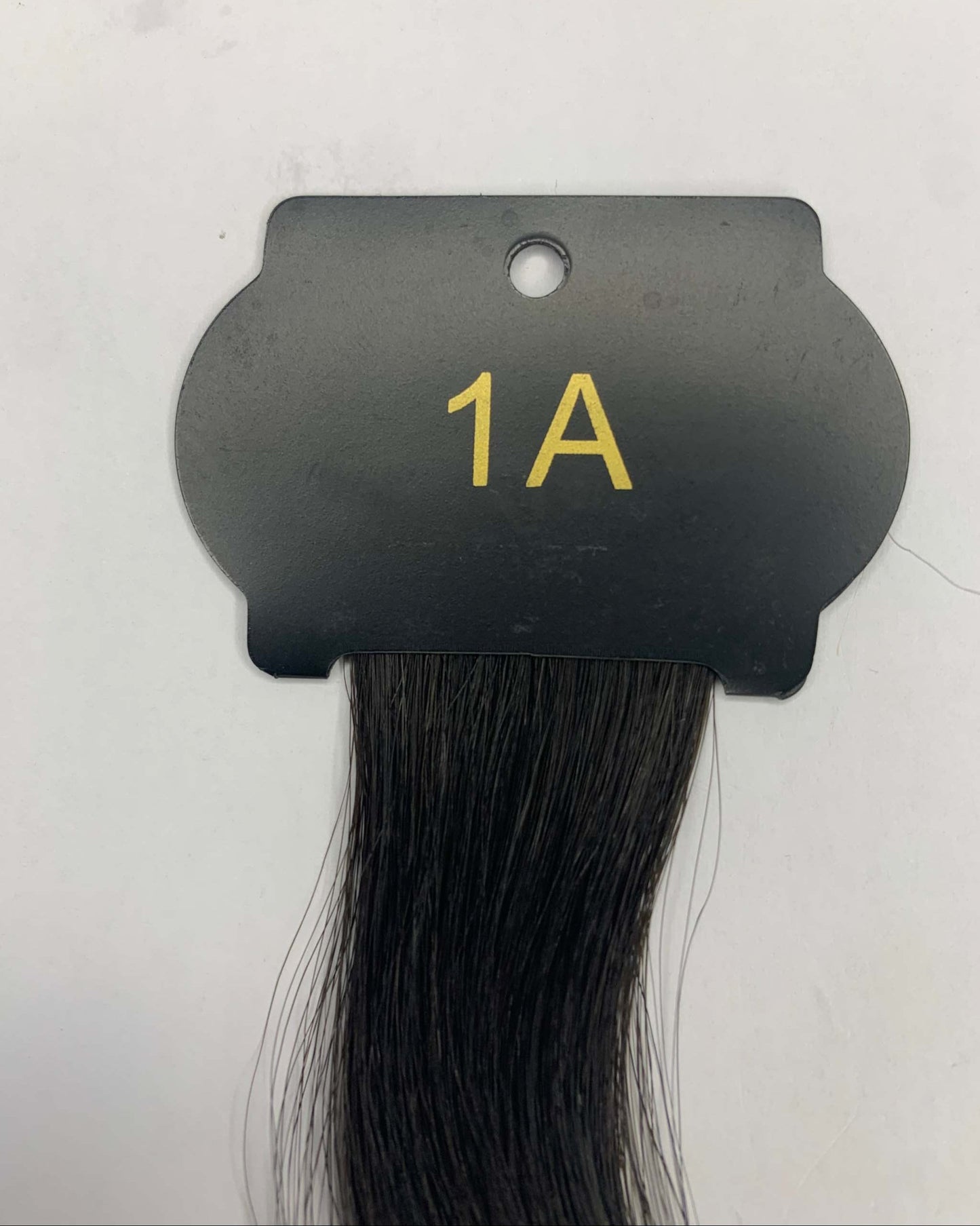 6D Hair Extensions, 26-inch length, natural black color sample.