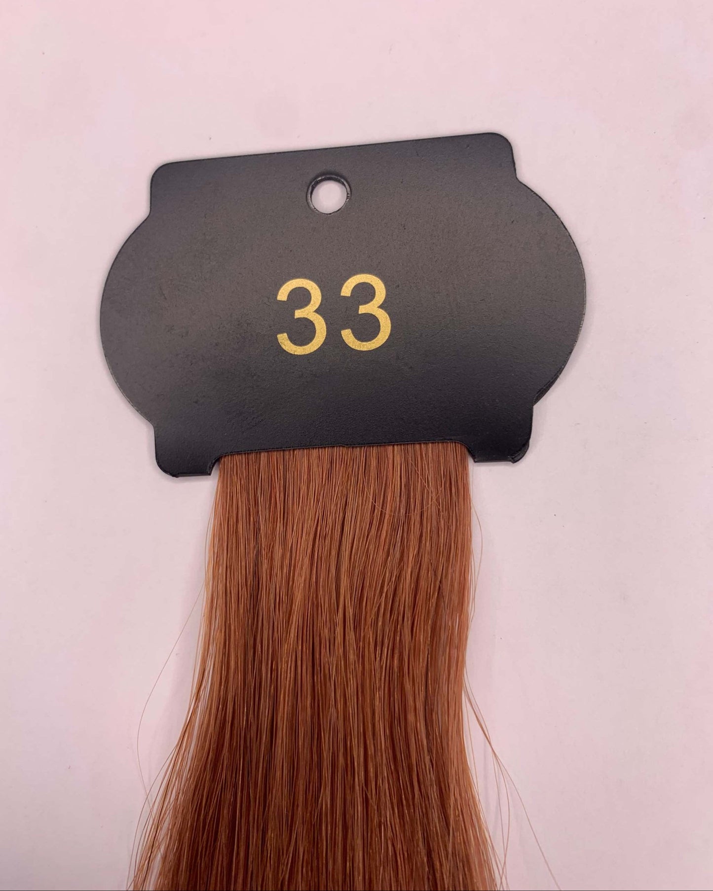 26-inch 6D human hair extensions in color 33, showcasing natural volume and length.