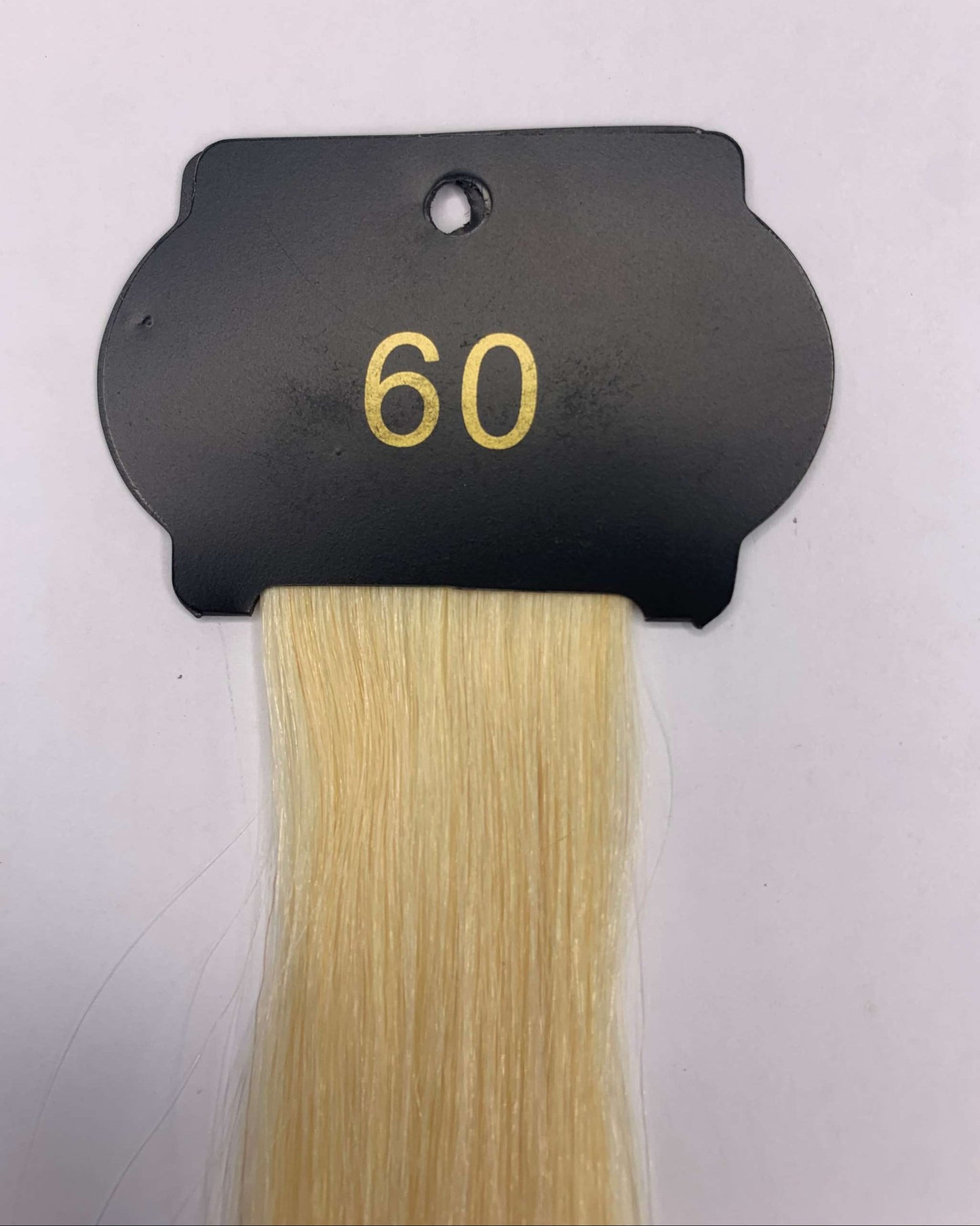 26 Inch 6D Hair Extensions sample, color 60, on a display card.