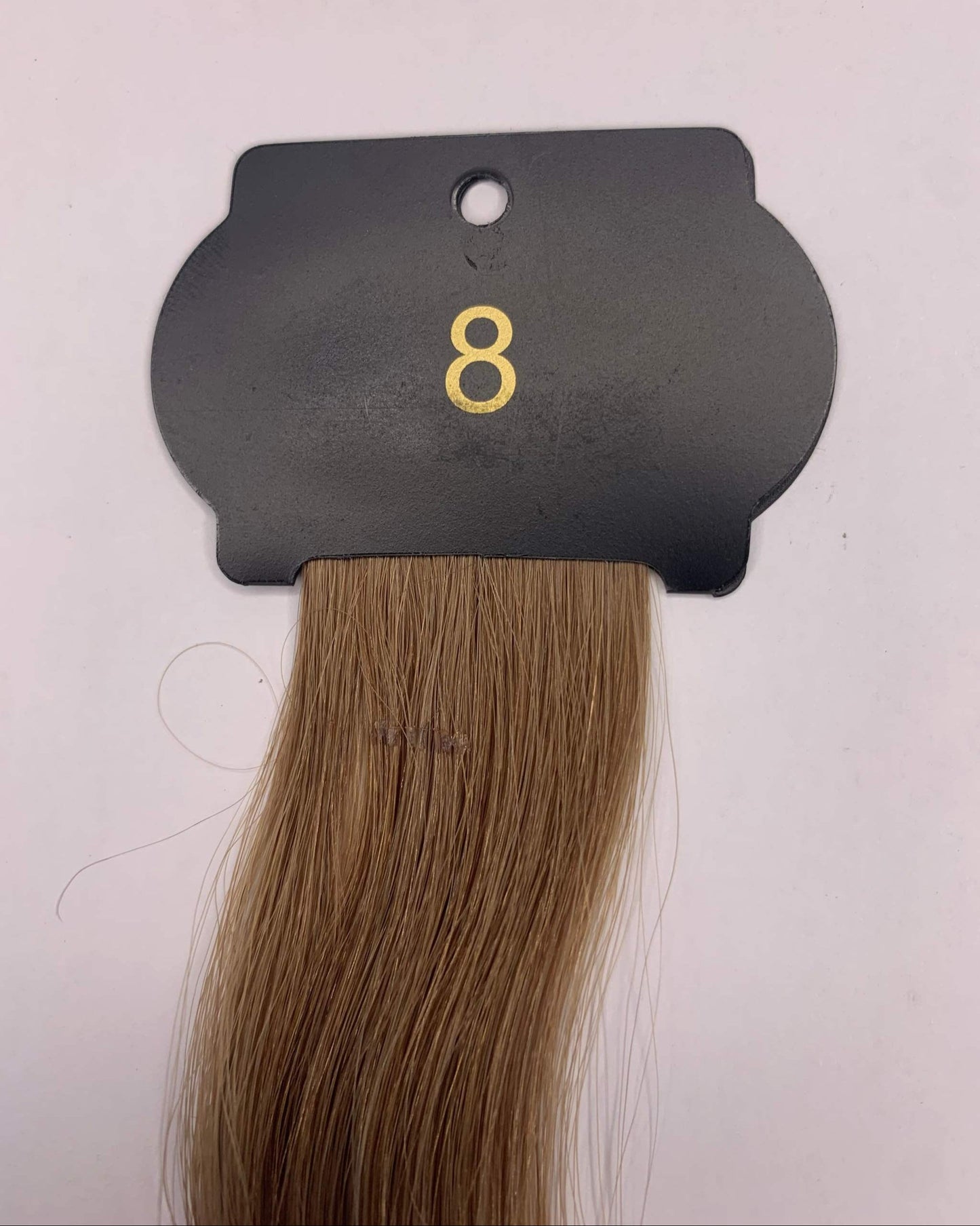 26-inch 6D hair extensions sample showing color number 8 and texture.