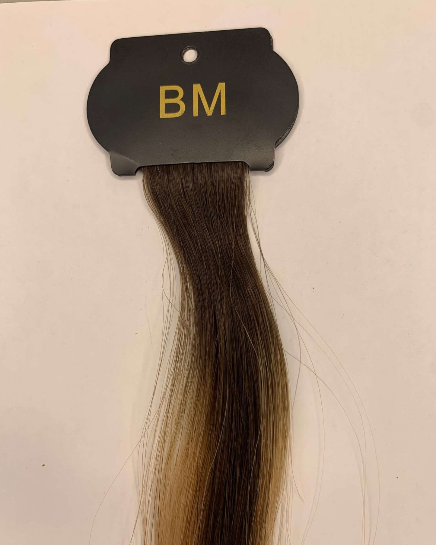 26 Inch 6D Hair Extensions in brown, for adding discreet length and volume.