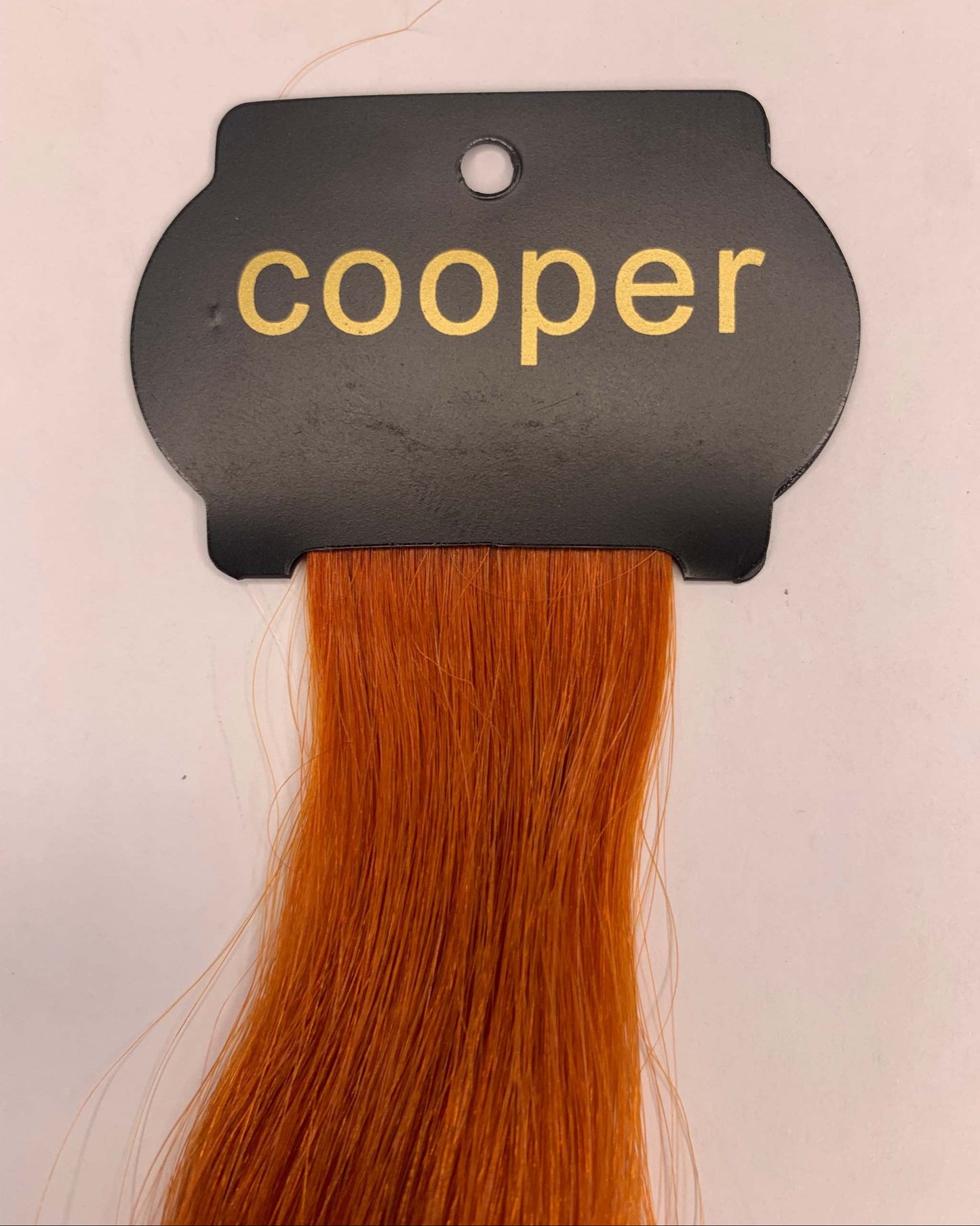 26 Inch 6D Hair Extensions in vibrant cooper shade.