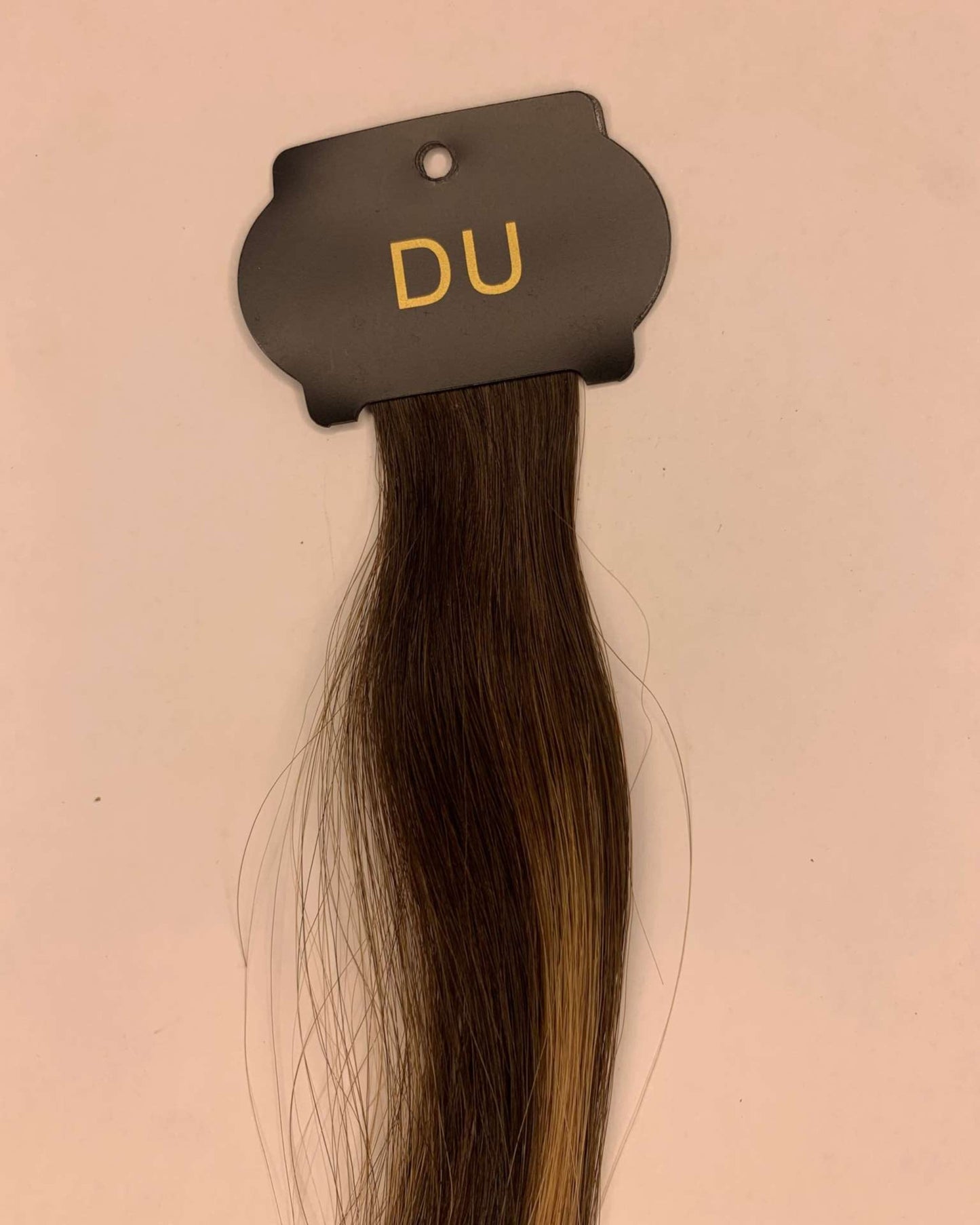 26-inch 6D hair extensions in brown shade on a display card.