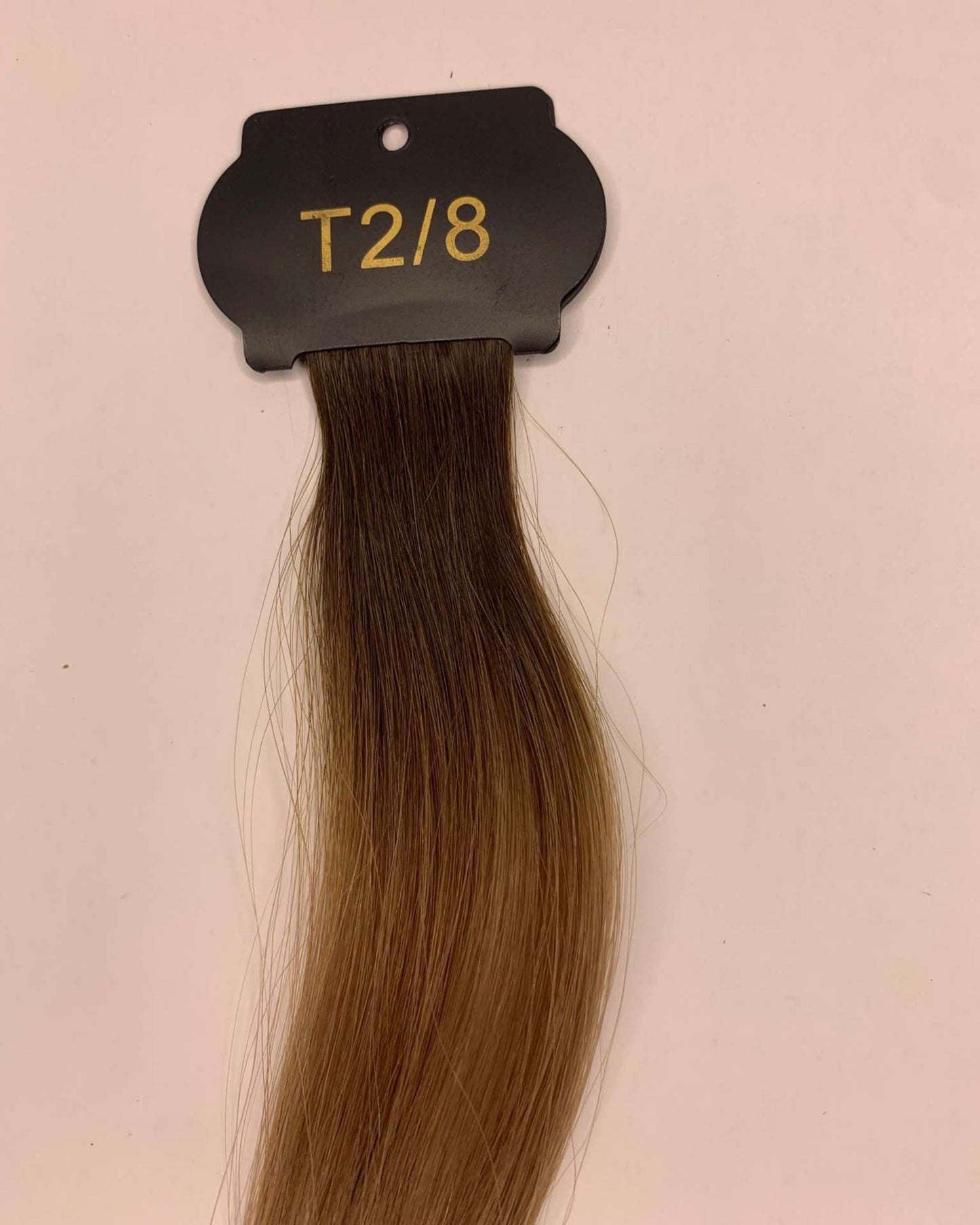 26-inch 6D hair extensions showcasing natural brown tones with label T2/8.