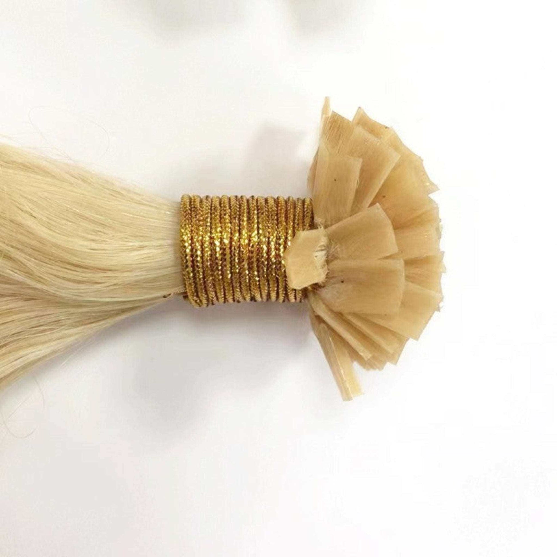 V tip Keratin 14-inch human hair extensions, pre-bonded with keratin tips for natural look.