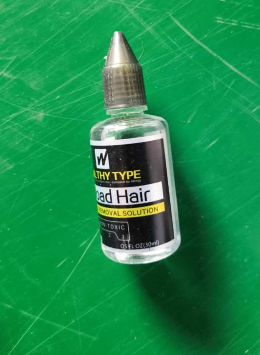 V-Light Hair Extension Removal Solution on green background, ideal for quick, pain-free hair extension removal.